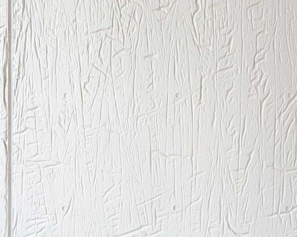 デニム生地を型枠に用いたコンクリート壁面